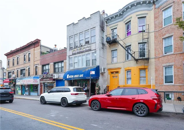 a car parked in front of a building
