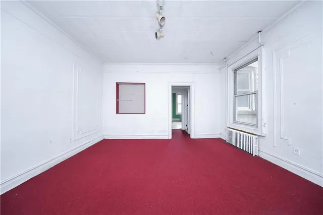 a kitchen with stainless steel appliances a sink and cabinets