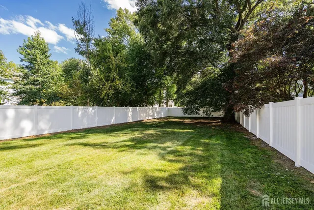 a view of swimming pool with a yard