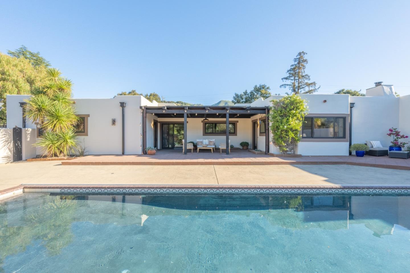 19 El Caminito Road Carmel Valley, CA 93924 - Photo 2 of 50 a house view with a swimming pool