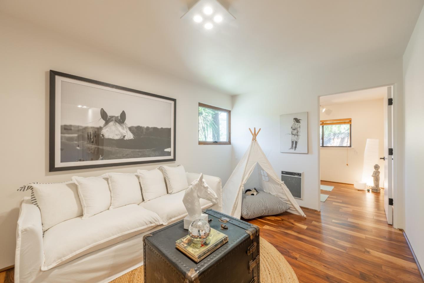 19 El Caminito Road Carmel Valley, CA 93924 - Photo 24 of 50 a living room with furniture and wooden floor