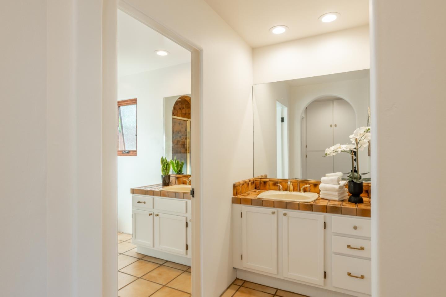 19 El Caminito Road Carmel Valley, CA 93924 - Photo 27 of 50 a bathroom with a sink and a mirror