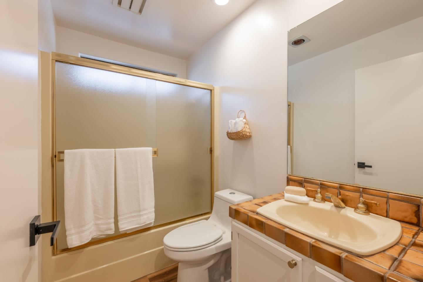 19 El Caminito Road Carmel Valley, CA 93924 - Photo 29 of 50 a bathroom with a sink toilet and shower