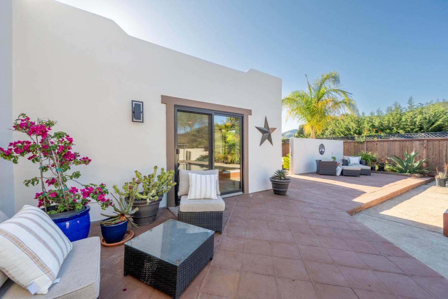 19 El Caminito Road Carmel Valley, CA 93924 - Photo 32 of 50 a living room with furniture and flowers