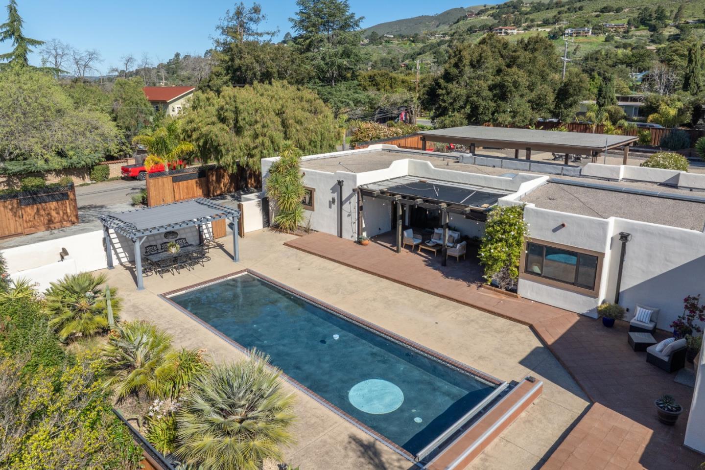 19 El Caminito Road Carmel Valley, CA 93924 - Photo 37 of 50 an aerial view of a house having patio