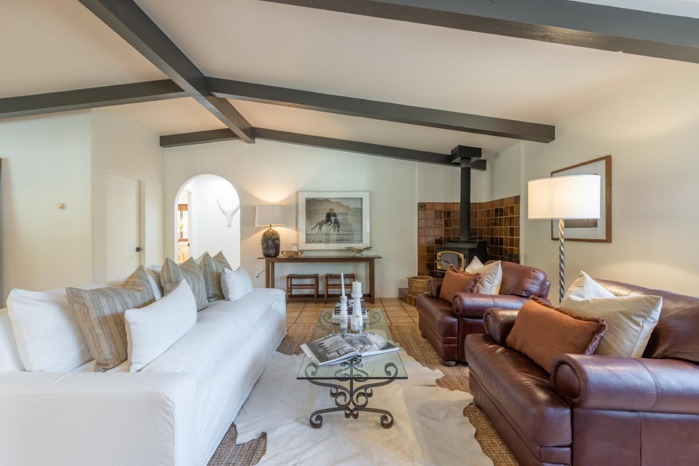 19 El Caminito Road Carmel Valley, CA 93924 - Photo 8 of 50 a living room with furniture and a fireplace