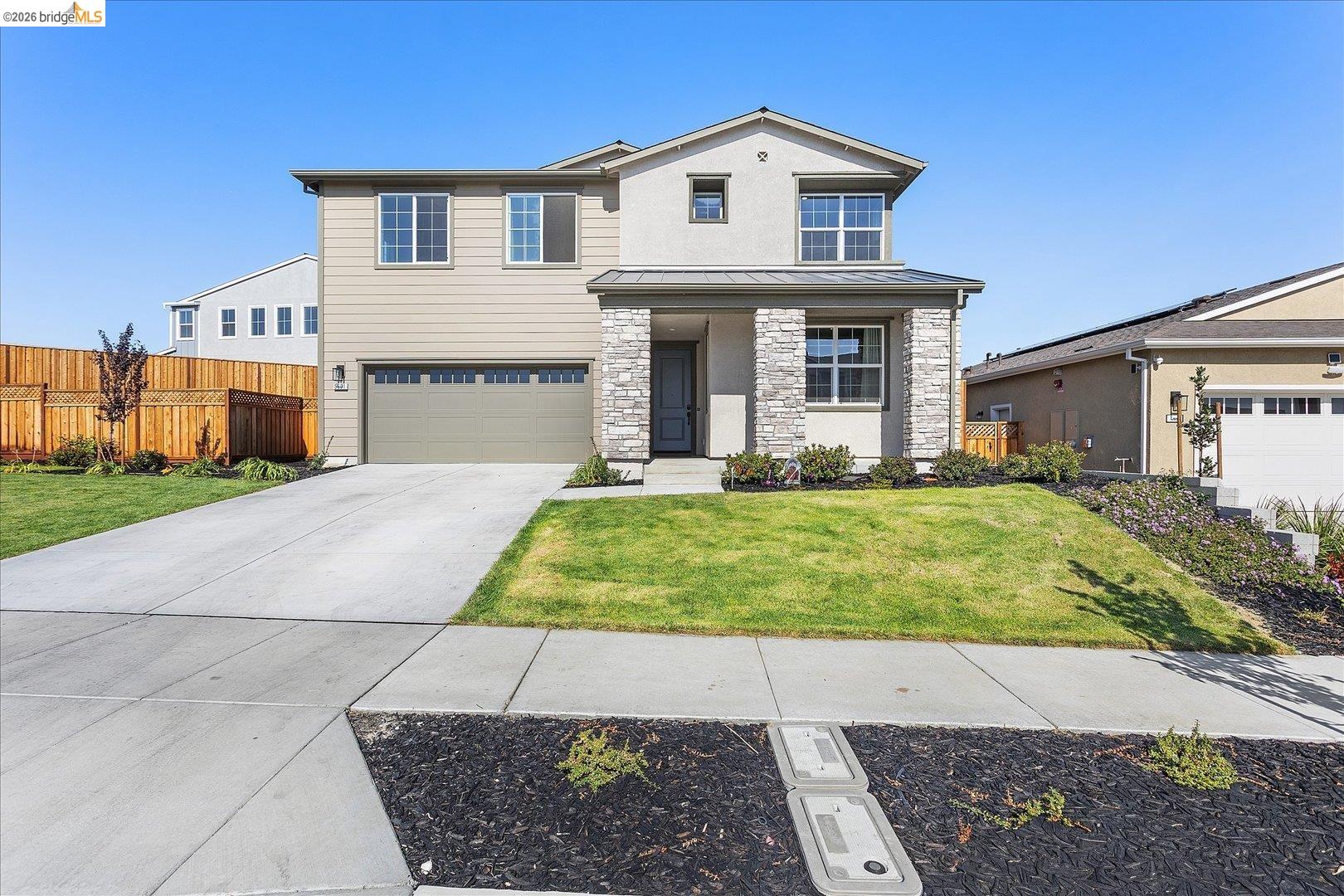 5601 Ridgepoint Way Antioch, CA 94531 - Photo 2 of 59 Contemporary two-story residence featuring a two-car garage, stone veneer accents, and a stucco and siding exterior
