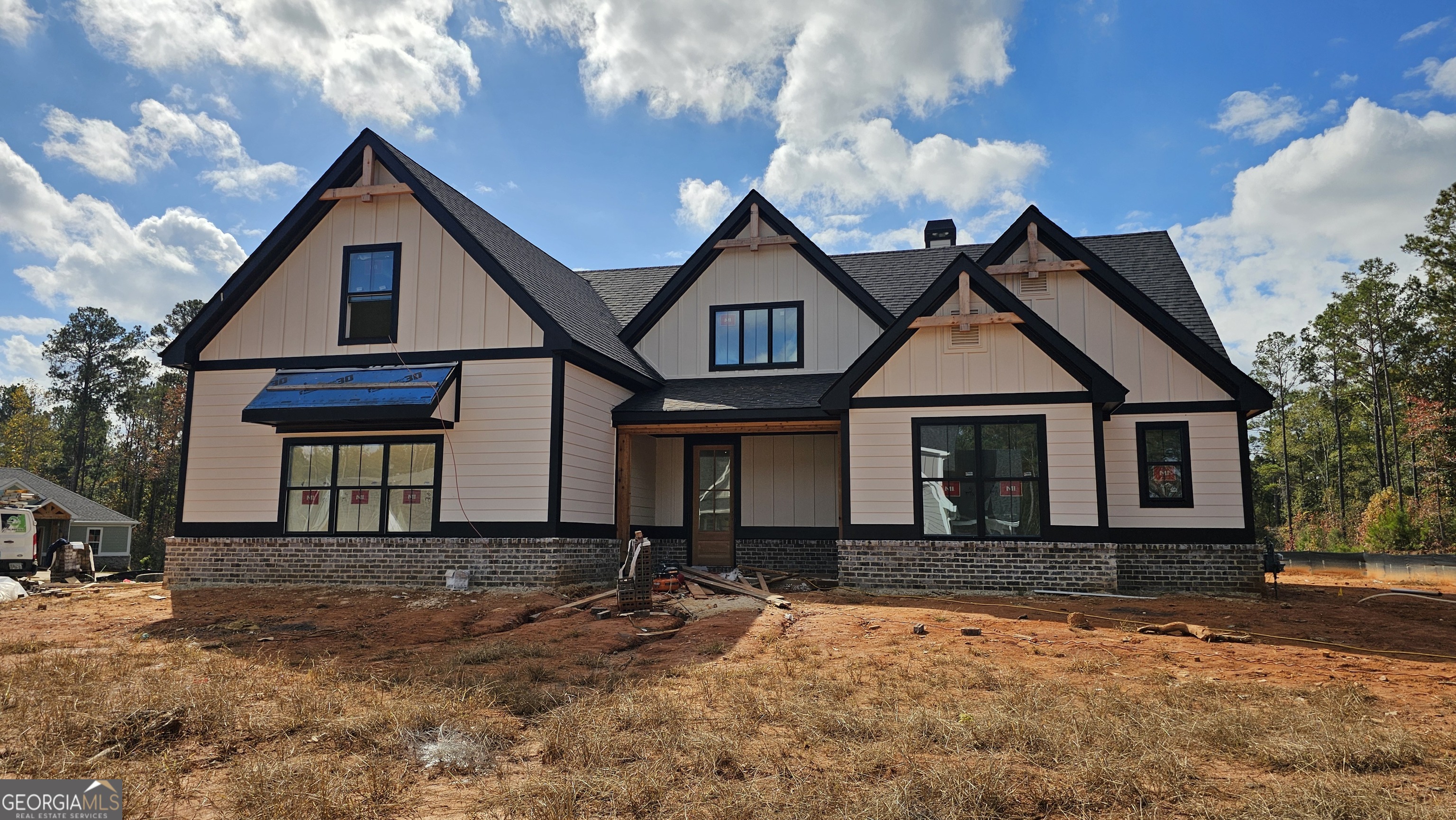 312 Clover Pass Forsyth, GA 31029 - Photo 12 of 22 a front view of a house with a yard
