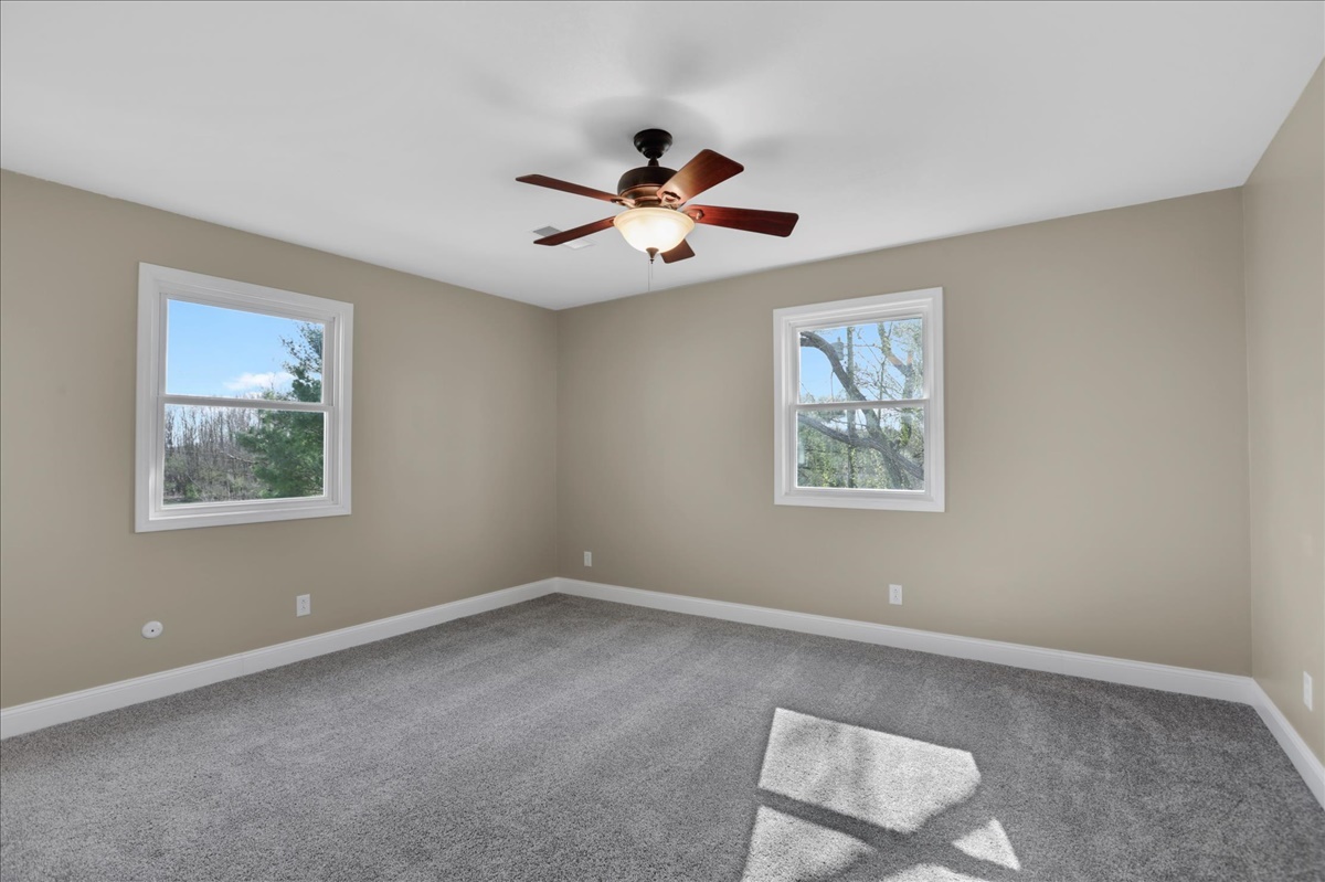 17105 Clinton Road Danville, IL 61834 - Photo 15 of 31 a view of an empty room with a window