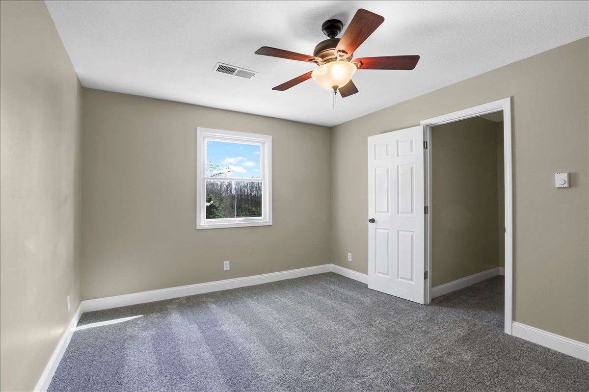 17105 Clinton Road Danville, IL 61834 - Photo 19 of 31 a view of an empty room with a window
