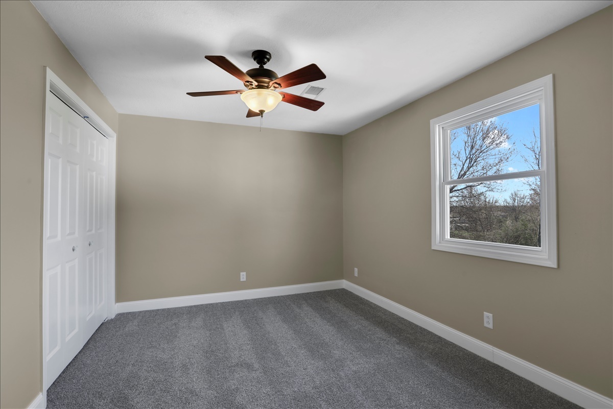 17105 Clinton Road Danville, IL 61834 - Photo 20 of 31 a view of an empty room with a window