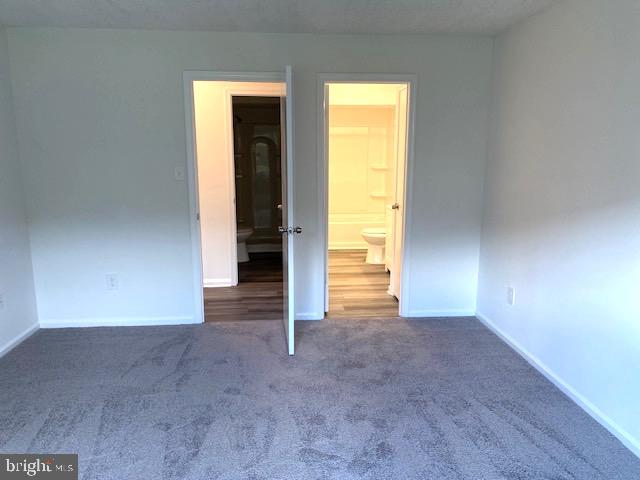 17 Pickwick Place, Unit 17 Sewell, NJ 08080 - Photo 18 of 26 Primary bedroom entrance to bathroom