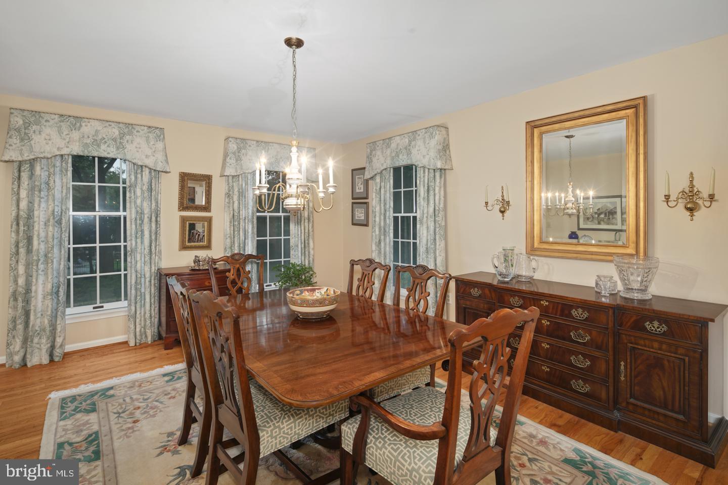 205 Pembroke Road Wallingford, PA 19086 - Photo 14 of 43 a view of a dining room with furniture window and wooden floor