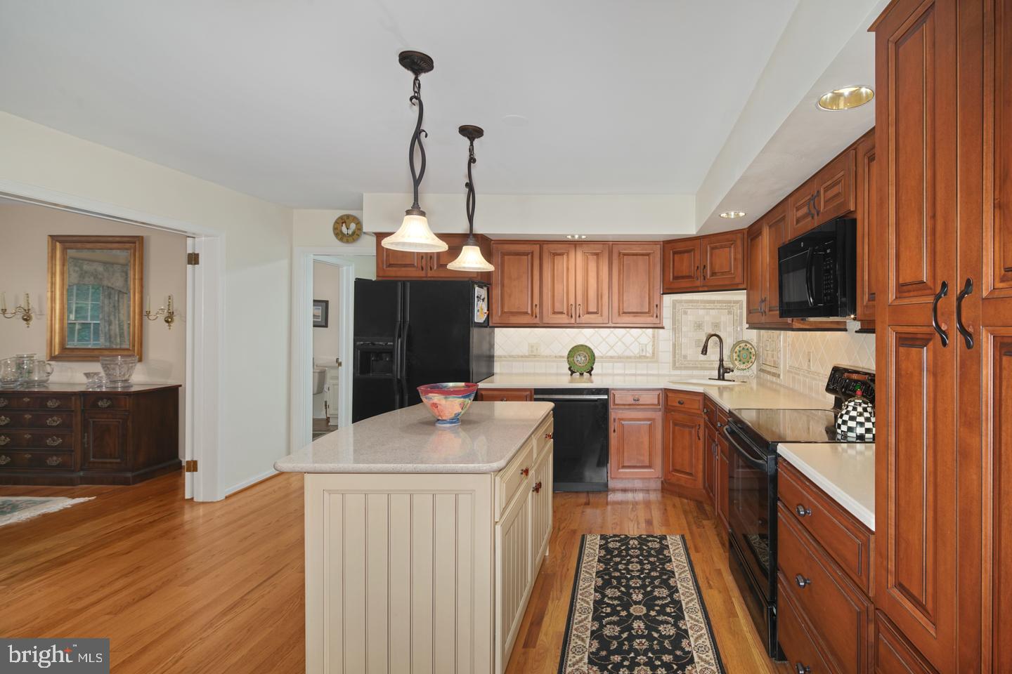 205 Pembroke Road Wallingford, PA 19086 - Photo 8 of 43 a kitchen with stainless steel appliances a sink stove and refrigerator