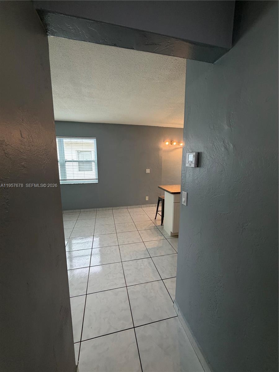 1301 North 12th Court, Unit 4B Hollywood, FL 33019 - Photo 23 of 27 a view of an empty room with a window