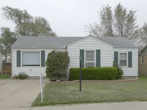 4115 Gables Street Amarillo, TX 79110 - Photo 1 of 6 front view of a house and a yard