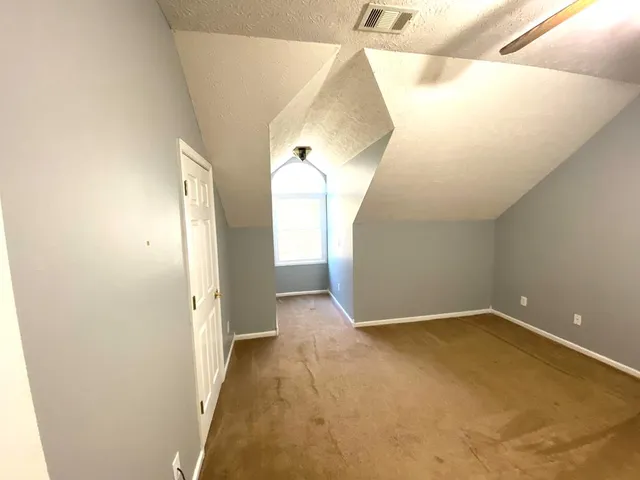 a view of a big room with wooden floor
