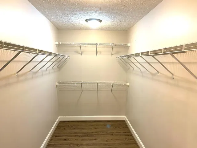 a view of a room with racks on the wall