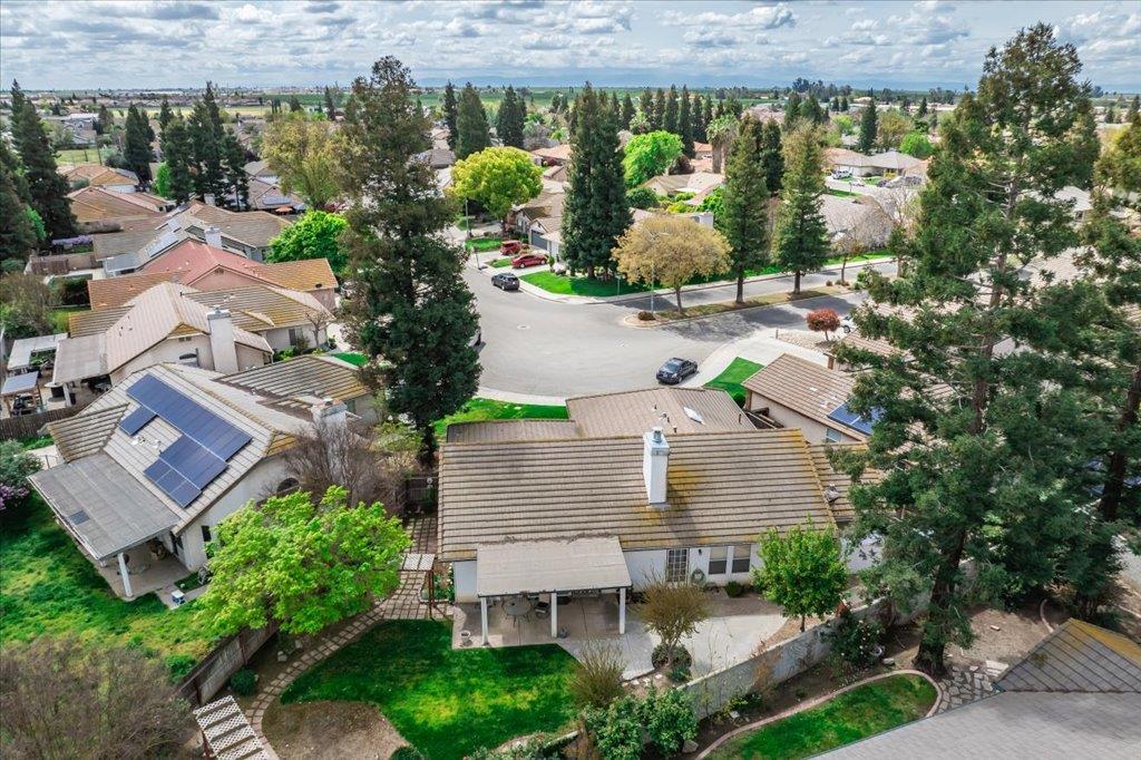 3159 Cedar Creek Lane Madera, CA 93637 - Photo 15 of 37 an aerial view of a house with a yard
