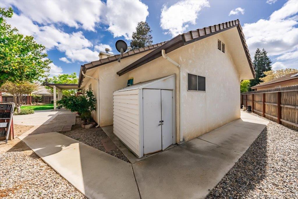 3159 Cedar Creek Lane Madera, CA 93637 - Photo 32 of 37 a view of a house with a large window