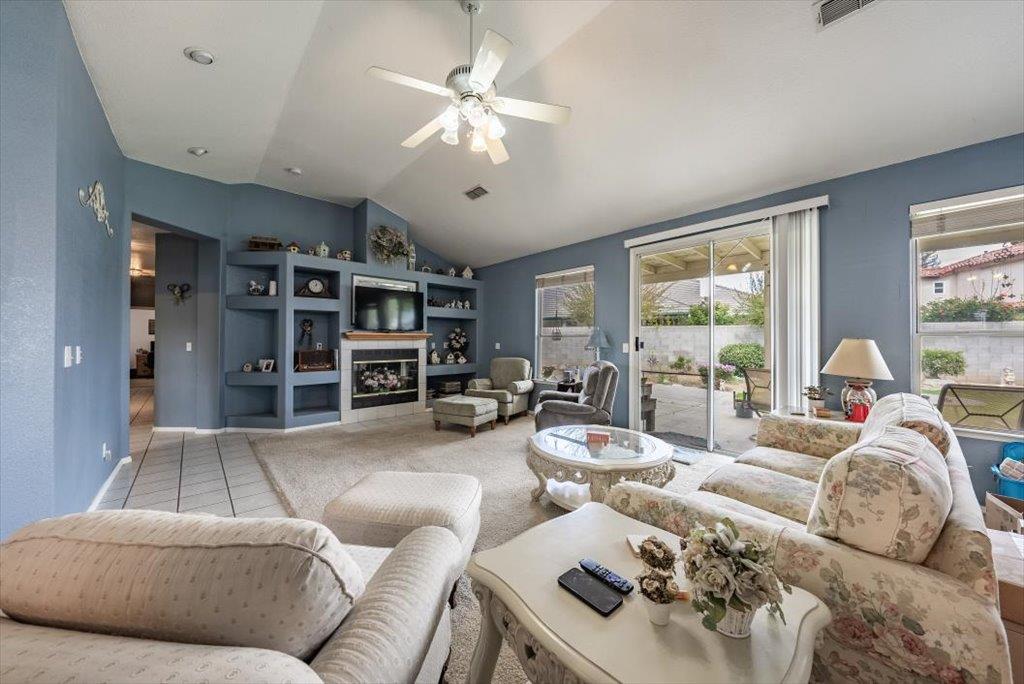 3159 Cedar Creek Lane Madera, CA 93637 - Photo 4 of 37 a living room with furniture and a large window