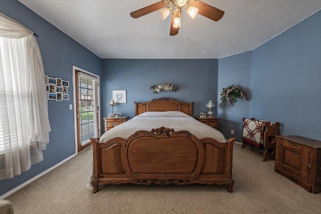 3159 Cedar Creek Lane Madera, CA 93637 - Photo 10 of 37 a bedroom with a bed and window