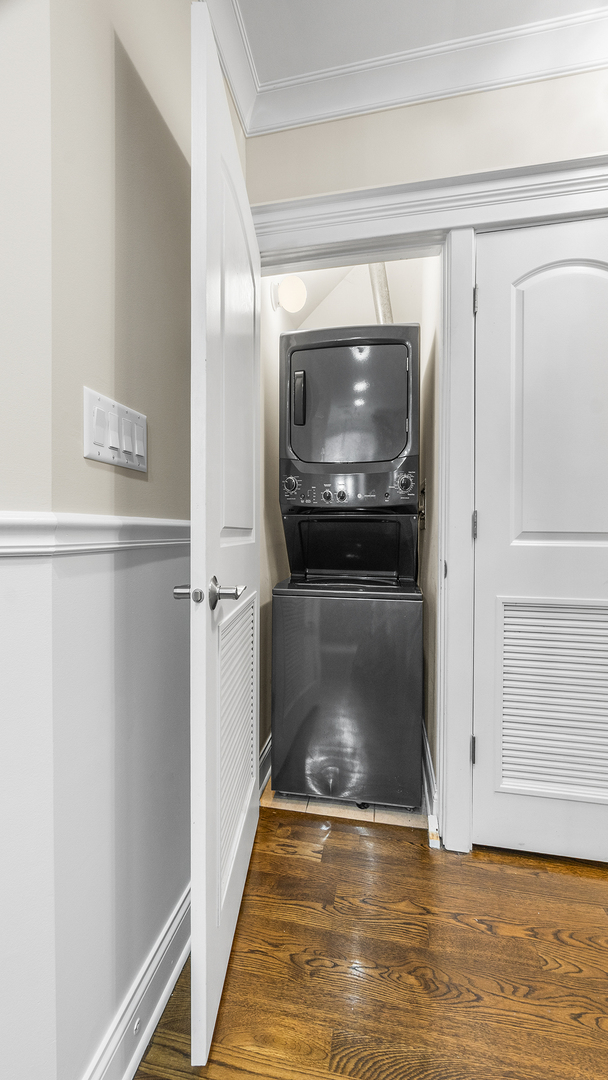 912 West Fletcher Street, Unit 2 Chicago, IL 60657 - Photo 15 of 29 a view of a hallway to an empty room and wooden floor