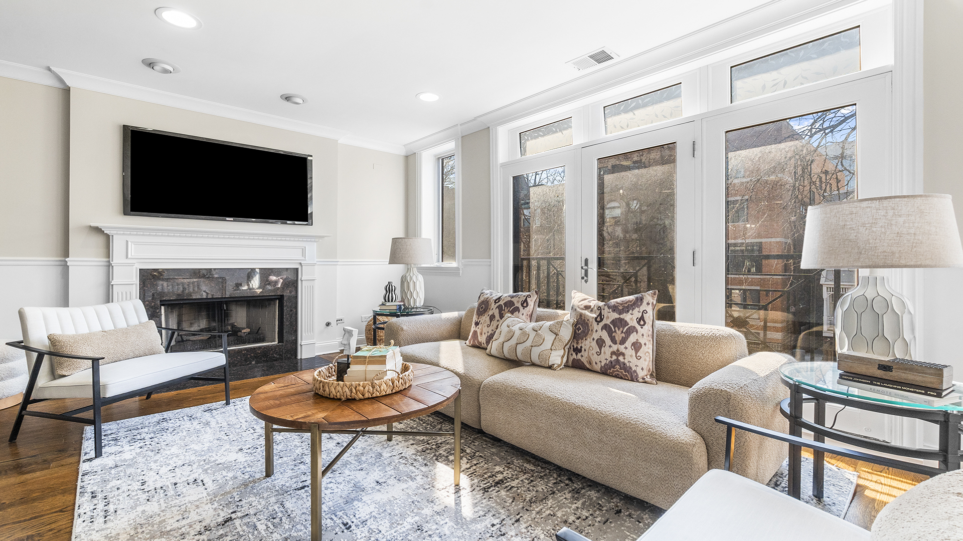 912 West Fletcher Street, Unit 2 Chicago, IL 60657 - Photo 6 of 29 a living room with furniture fireplace and flat screen tv