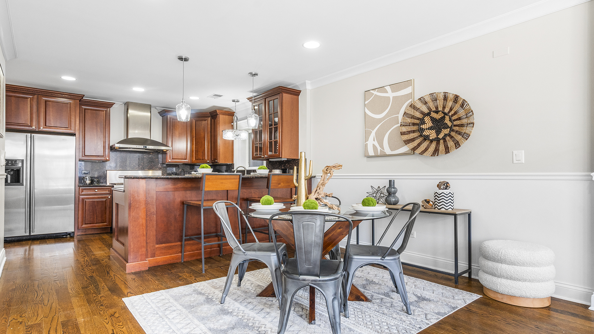 912 West Fletcher Street, Unit 2 Chicago, IL 60657 - Photo 9 of 29 a dining room with furniture and wooden floor