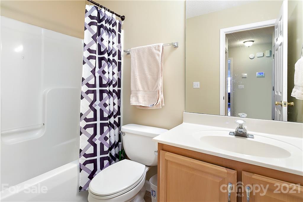 168 Sea Island Boulevard, Unit 26 Fort Mill, SC 29708 - Photo 17 of 17 a bathroom with a sink toilet and shower