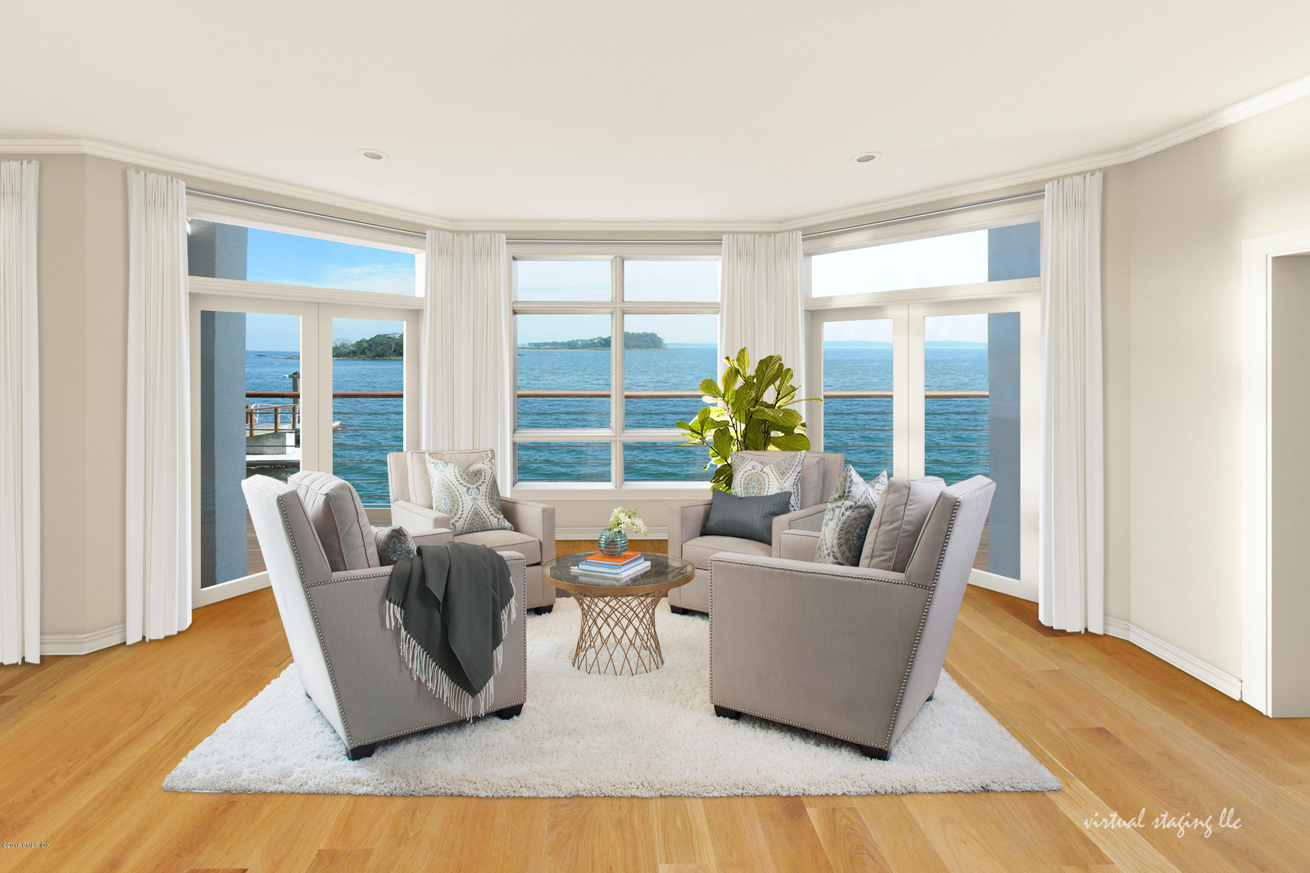 71 Byram Shore Road Greenwich, CT 06830 - Photo 13 of 32 a living room with furniture and a large window