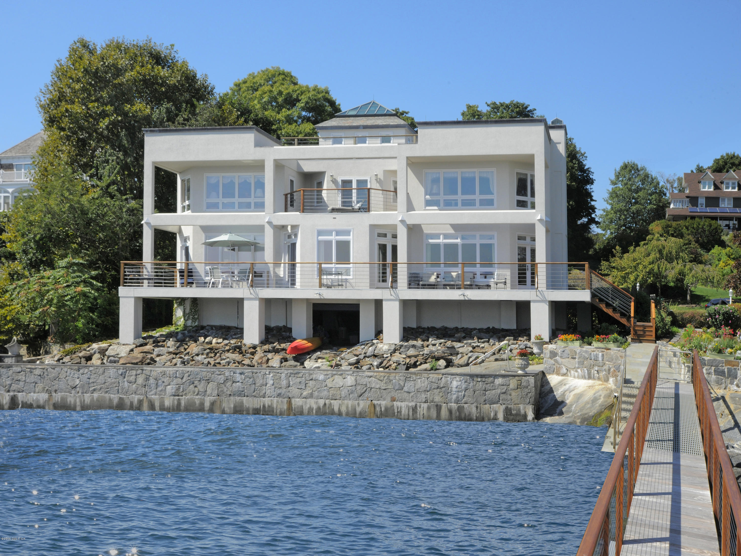 71 Byram Shore Road Greenwich, CT 06830 - Photo 2 of 32 a front view of building with street view