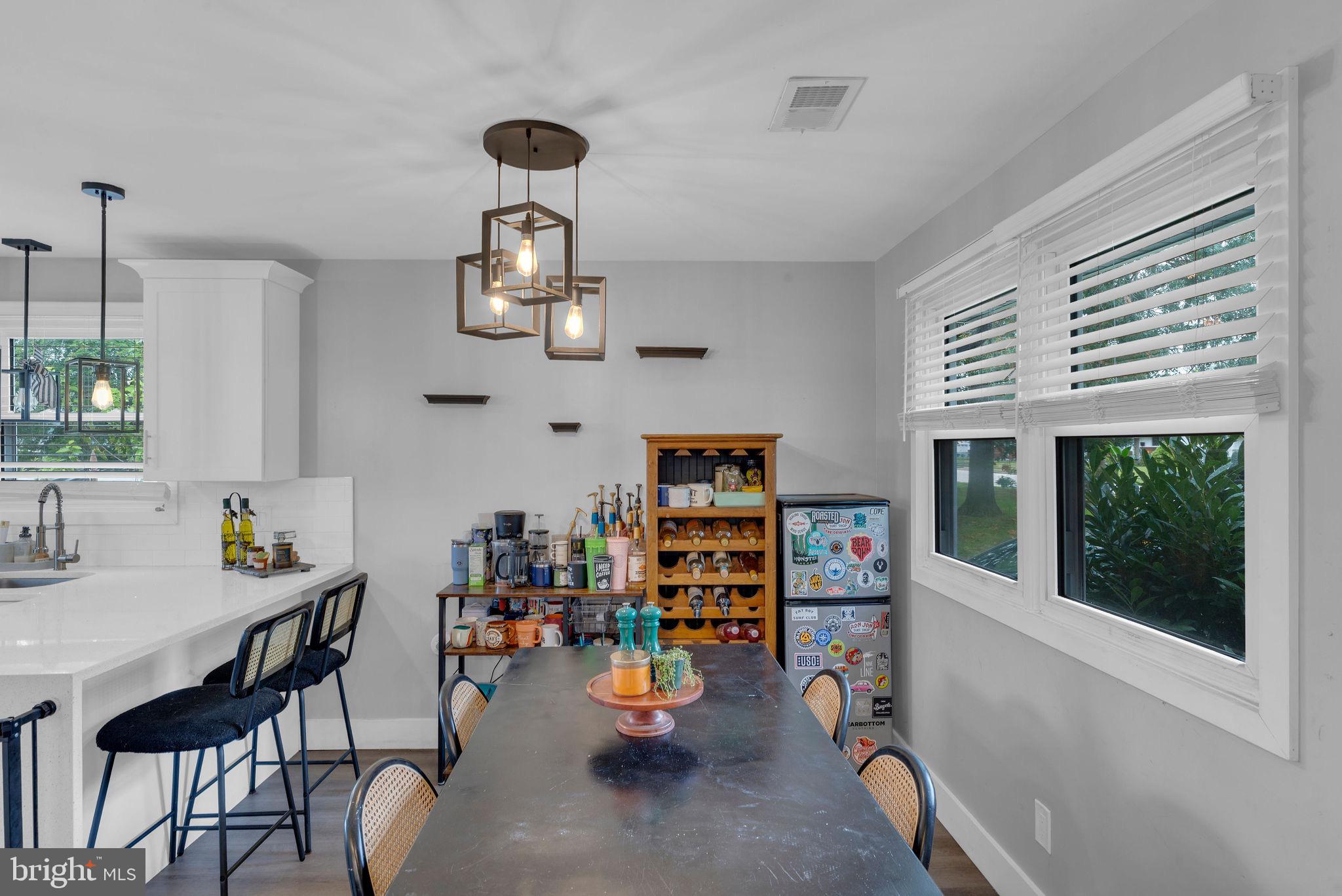 629 Polk Street Riverside, NJ 08075 - Photo 14 of 42 a view of a dining room with a table and chairs