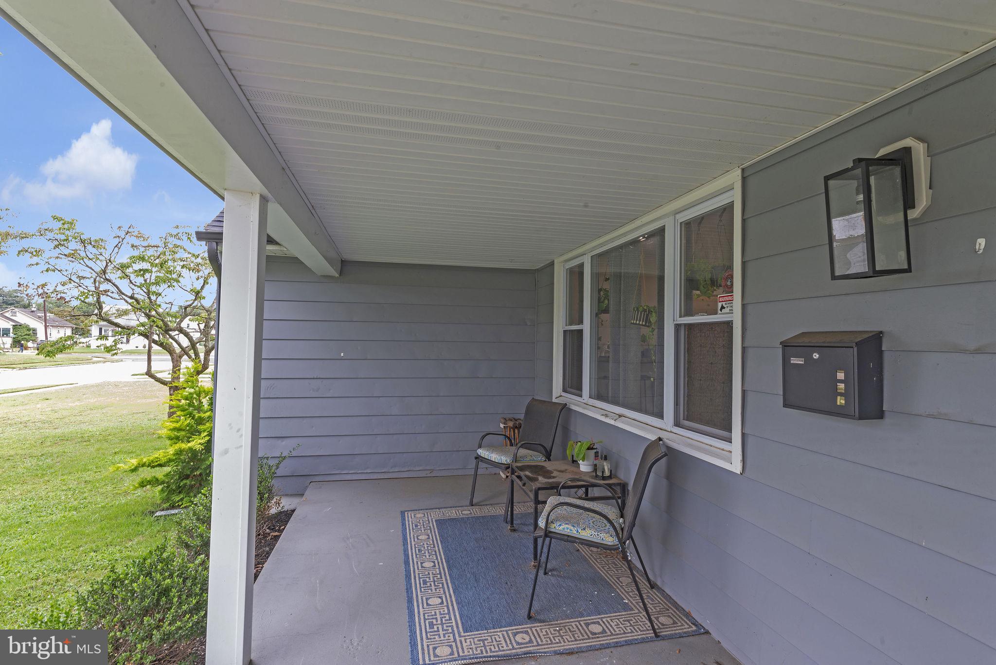 629 Polk Street Riverside, NJ 08075 - Photo 2 of 42 a view of a porch with furniture and garden