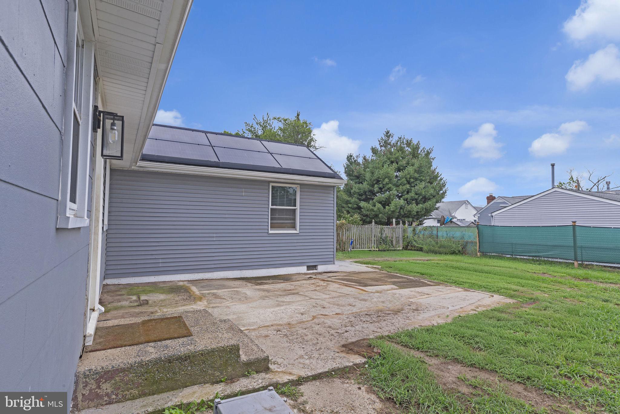 629 Polk Street Riverside, NJ 08075 - Photo 26 of 42 a view of a house with a yard