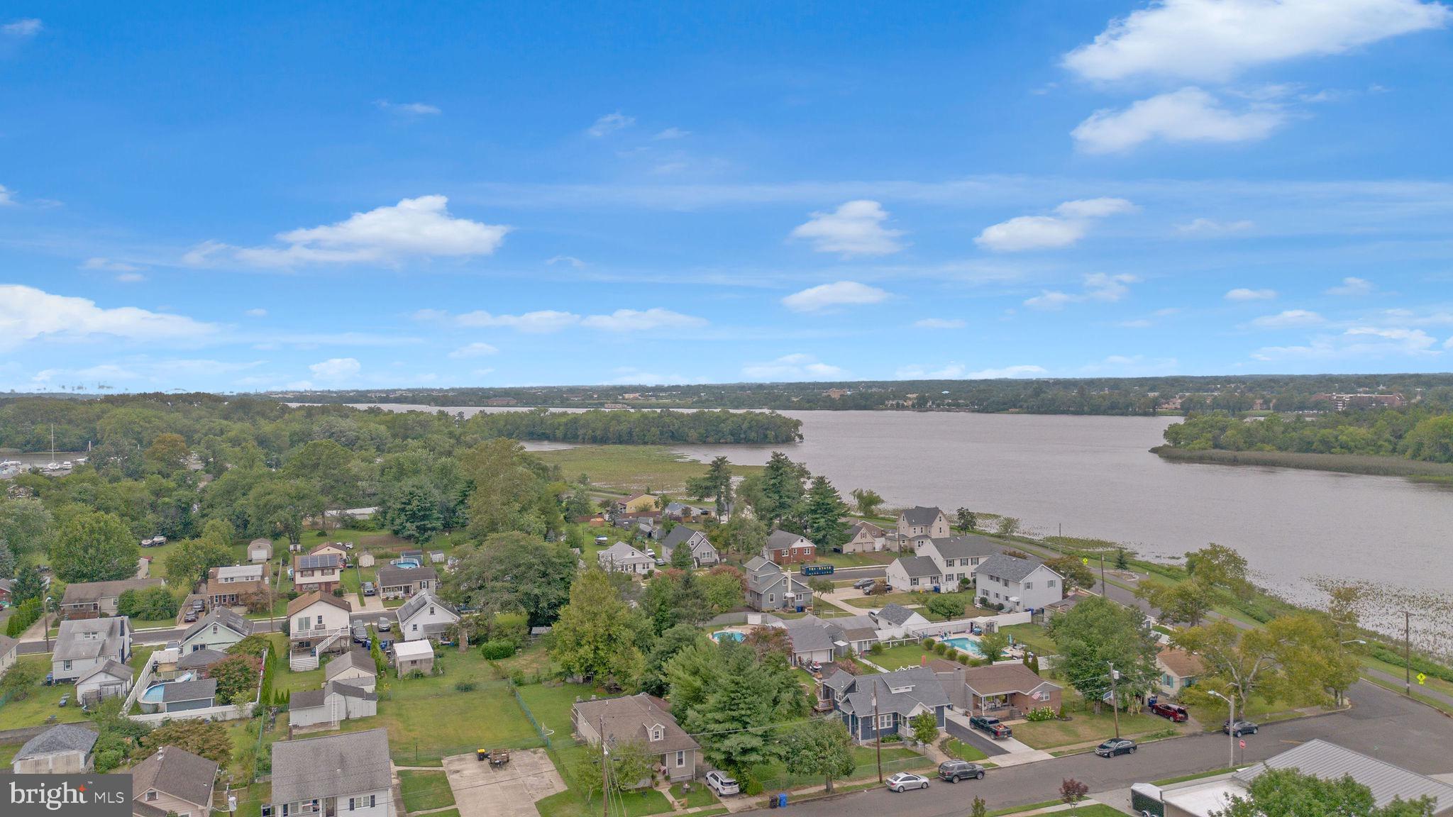 629 Polk Street Riverside, NJ 08075 - Photo 37 of 42 a view of a lake with a city