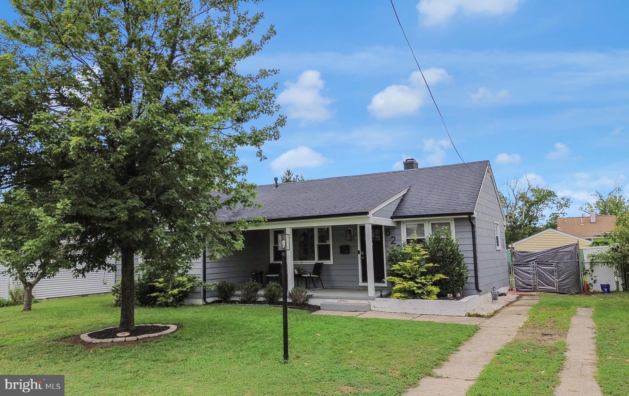 629 Polk Street Riverside, NJ 08075 - Photo 4 of 42 a front view of a house with a yard