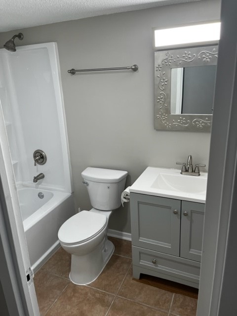 1800 Lavaca Street, Unit 607 Austin, TX 78701 - Photo 7 of 22 a white toilet sitting next to a bathroom sink