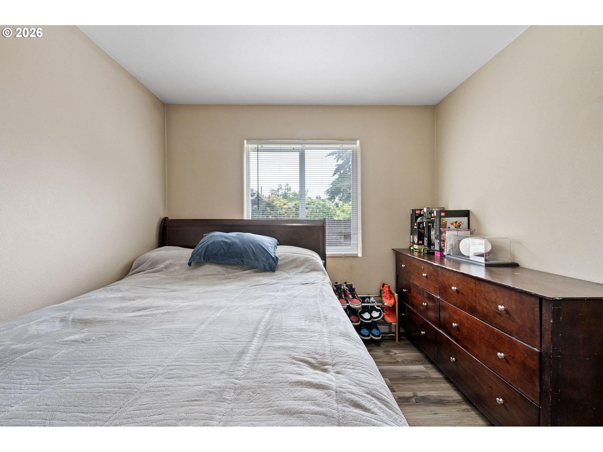 1055 Ash Grove Loop Creswell, OR 97426 - Photo 21 of 33 a bedroom with a bed and window
