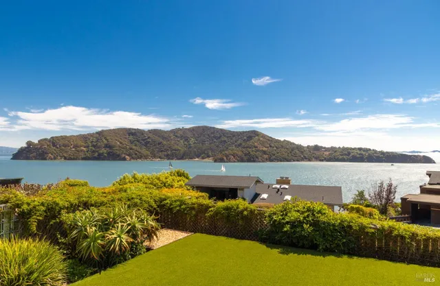 a view of a lake with a mountain
