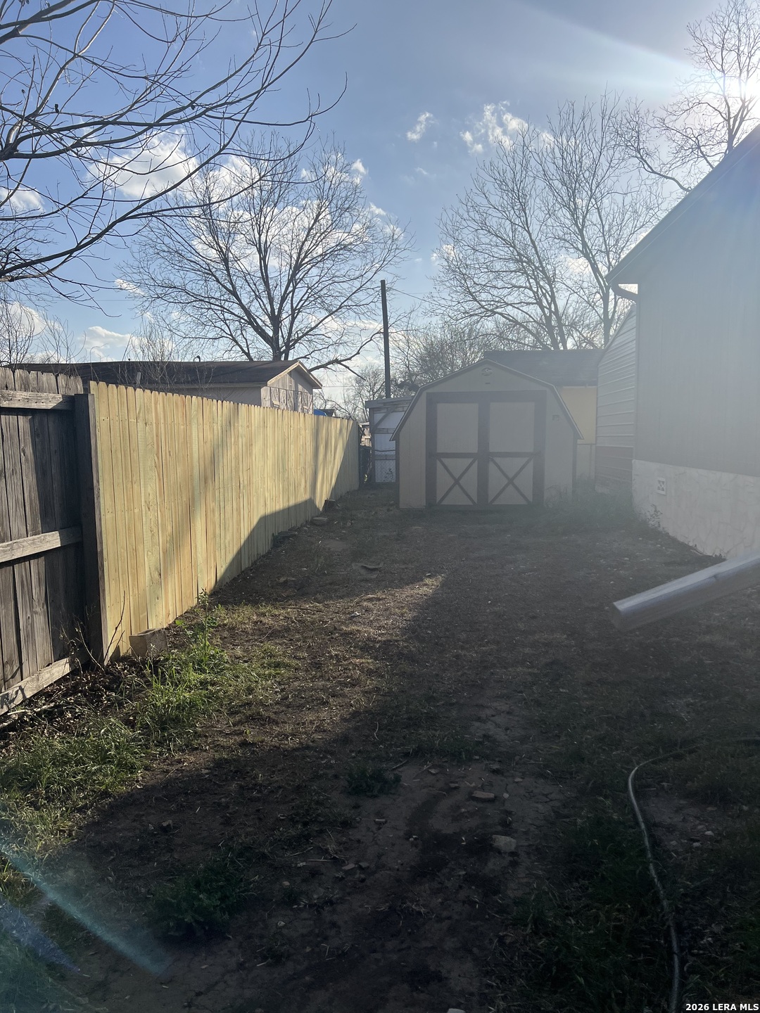 218 West 2nd Street Elmendorf, TX 78112 - Photo 13 of 13 a view of backyard and tree