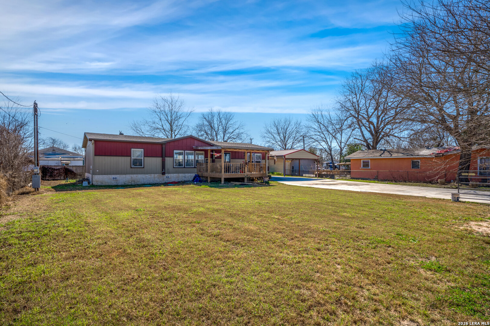 218 West 2nd Street Elmendorf, TX 78112 - Photo 3 of 13 a view of a lake with a building in the background
