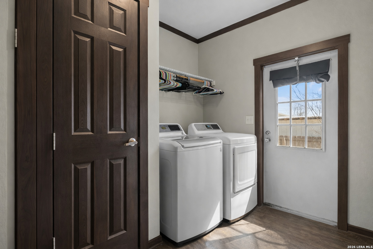 218 West 2nd Street Elmendorf, TX 78112 - Photo 7 of 13 a utility room with dryer and washer
