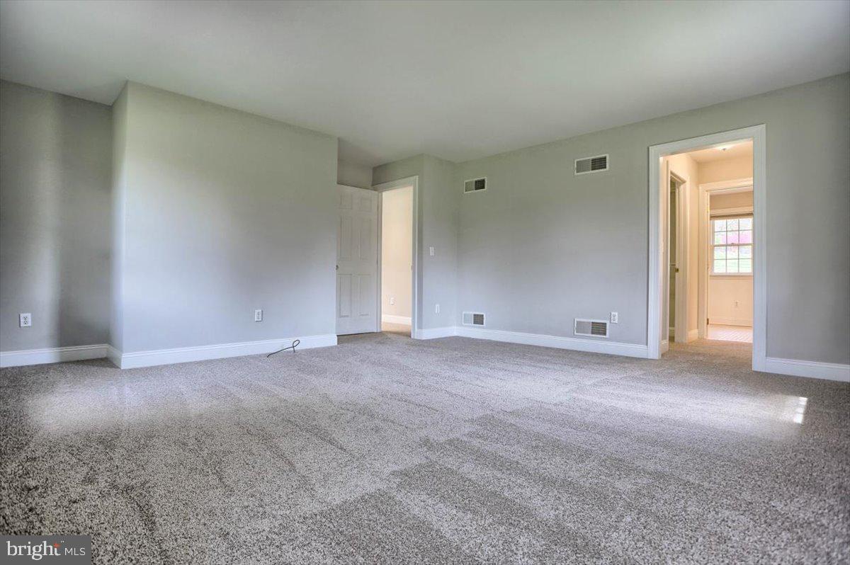 467 Old Stage Road Lewisberry, PA 17339 - Photo 23 of 44 First floor primary bedroom