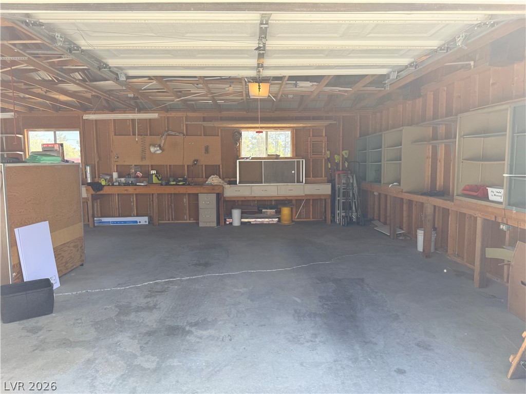 1391 West Dyer Road Pahrump, NV 89048 - Photo 14 of 50 Ample space for projects and parking awaits in this versatile garage.