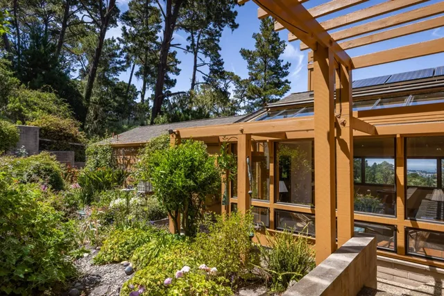 an outdoor view of garden with patio
