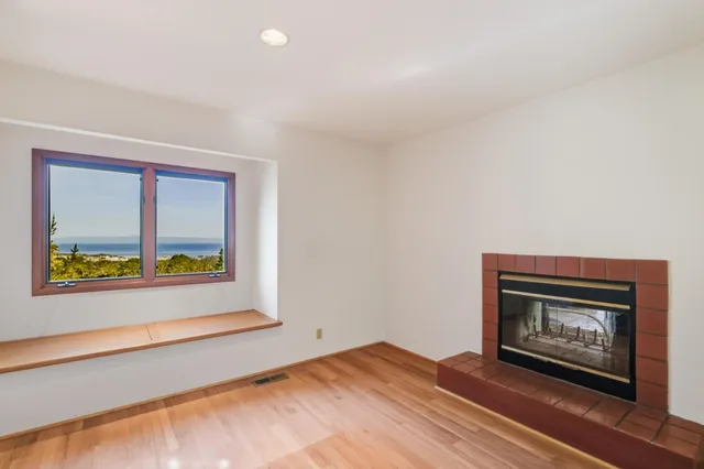 a view of an empty room and window