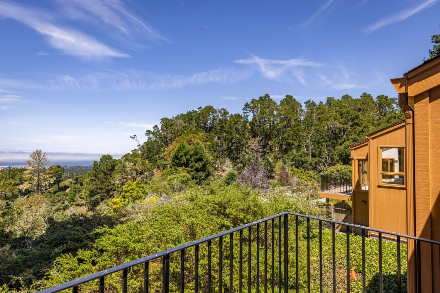 540 Aguajito Road Carmel, CA 93923 - Photo 23 of 35 a view of a balcony with two plants