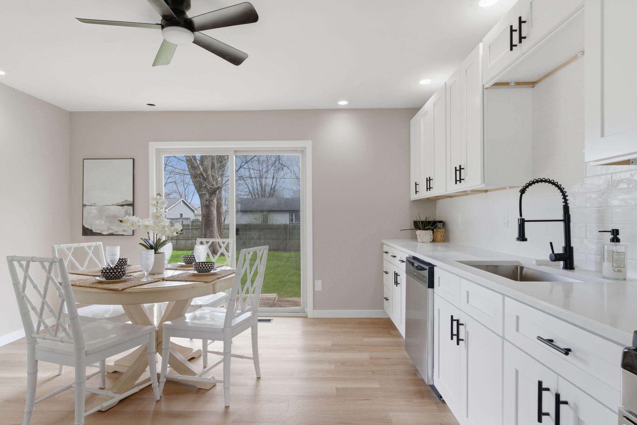 621 Old Forge Road Valparaiso, IN 46385 - Photo 3 of 15 a kitchen with stainless steel appliances a sink window and cabinets