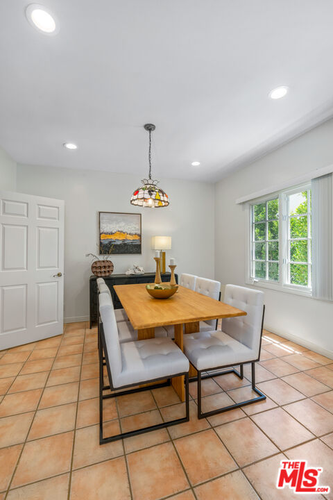 1663 Malcolm Avenue, Unit 103 Los Angeles, CA 90024 - Photo 15 of 45 a view of a dining room with furniture